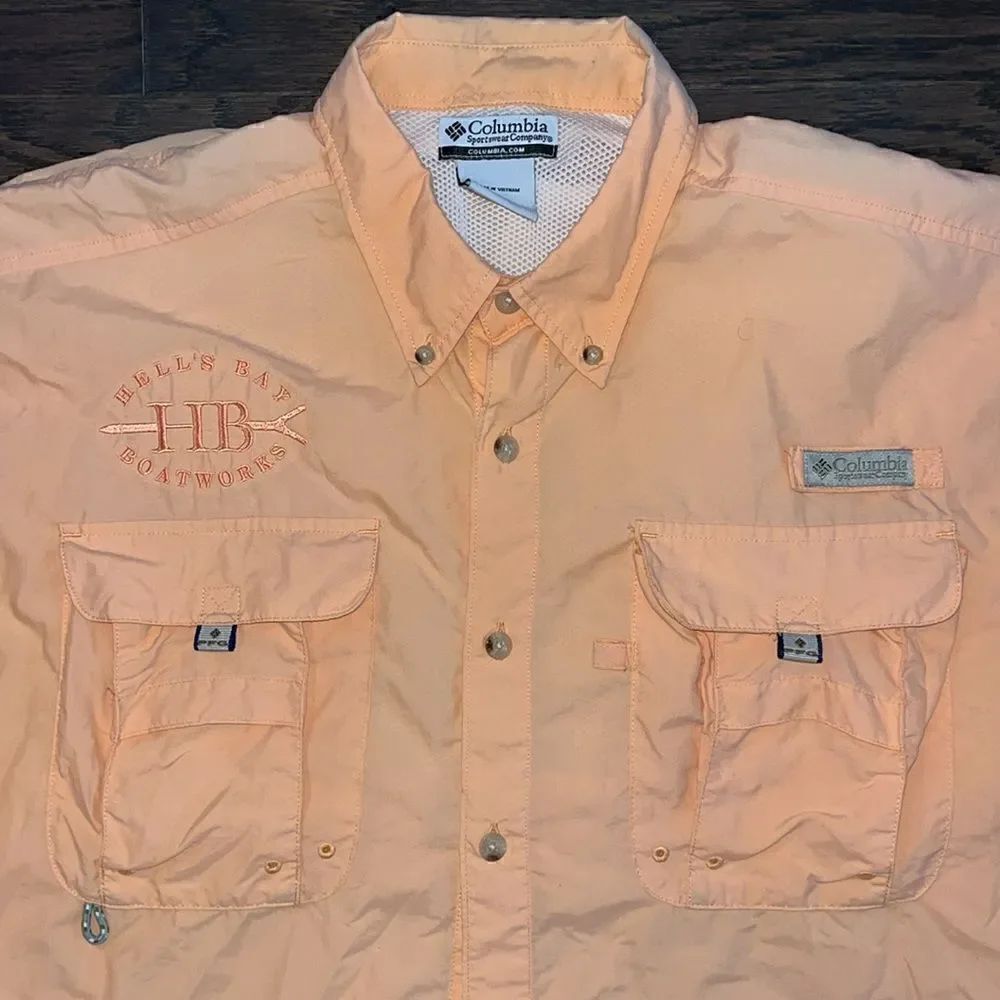 Worn Hells Bay Boatworks Titusville FL orange bonefish Nylon PFG fishing shirt M